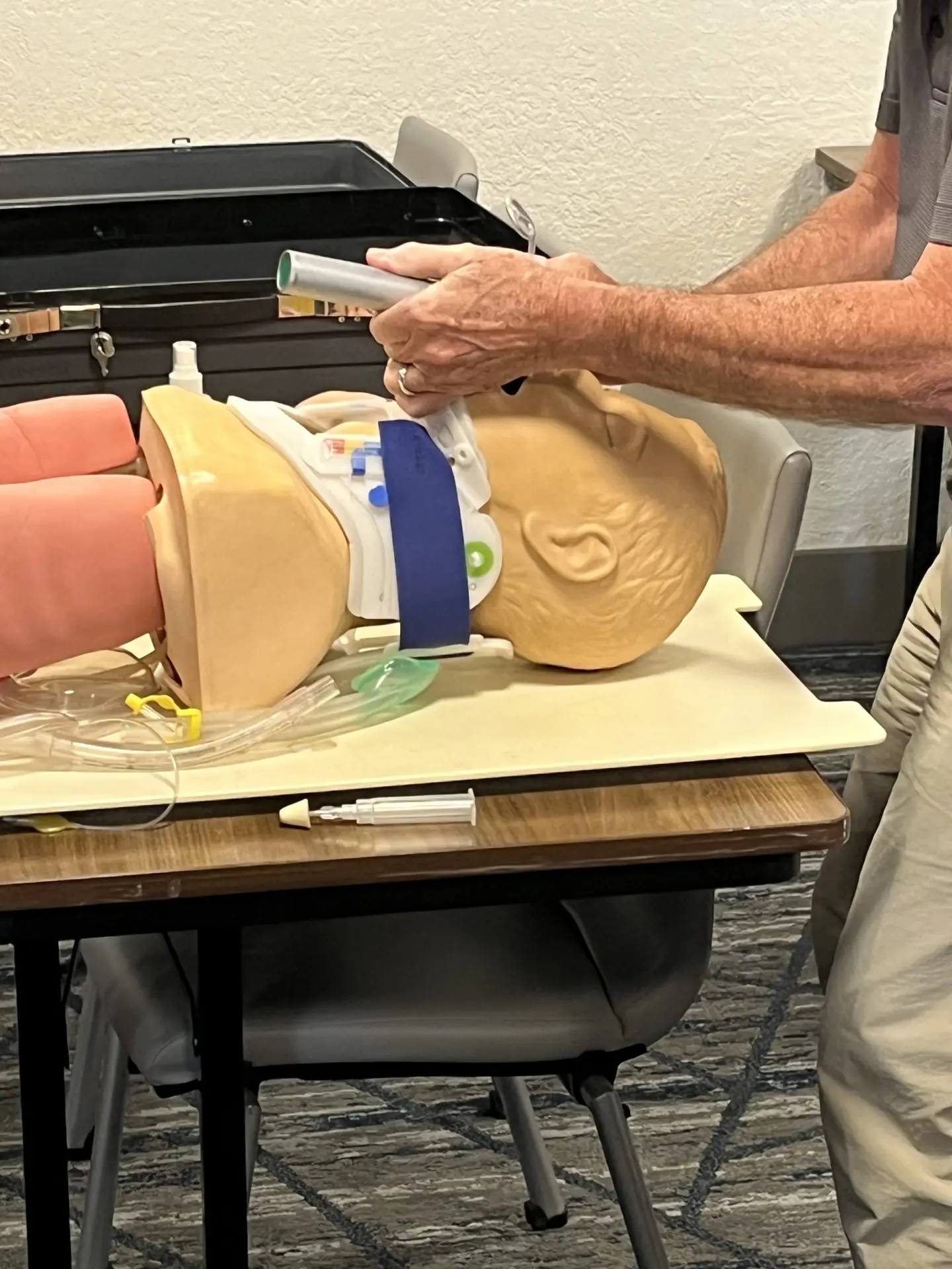 Instructor demonstrating advanced airway technique during ACLS certification training